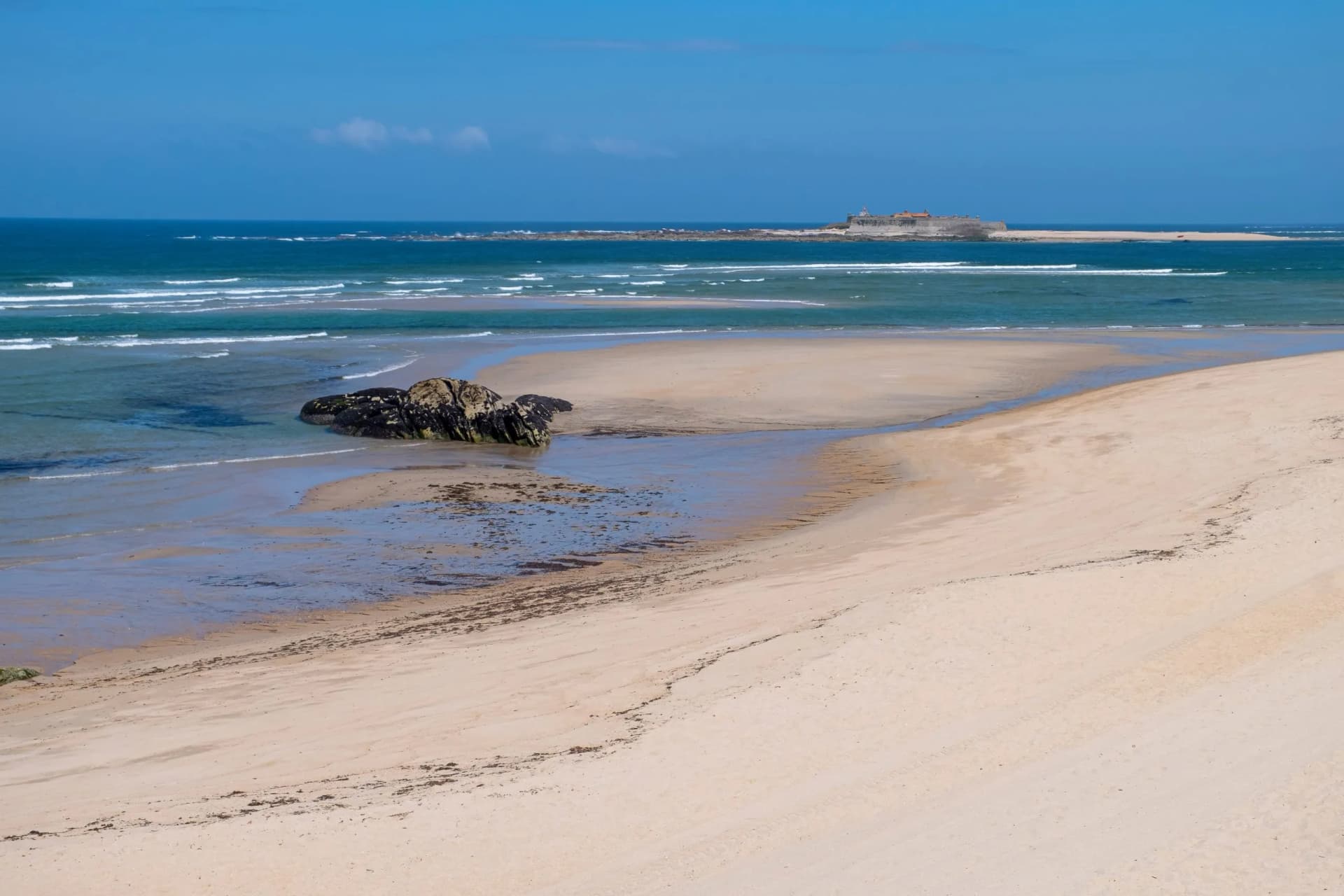 Panoramic view of Praia de Moledo beach and Forte da Insua fortress. Municipality of Caminha, Portugal.