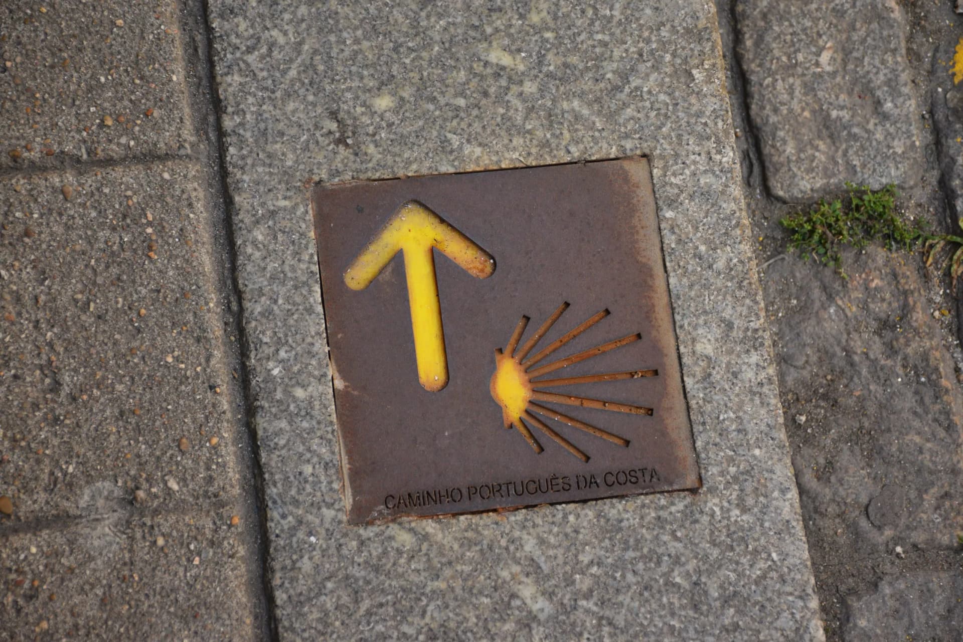 Camino de Santiago, the Portuguese Coastal Way (Caminho Portuguese de Costa), sign on the floor, Porto, Portugal