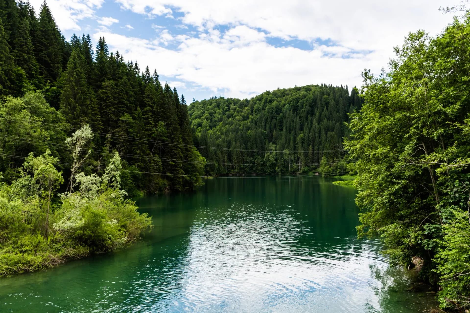 Scropoasa Lake, an artificial dam lake in the Bucegi Mountains, on the valley of the Ialomita River. Romania.