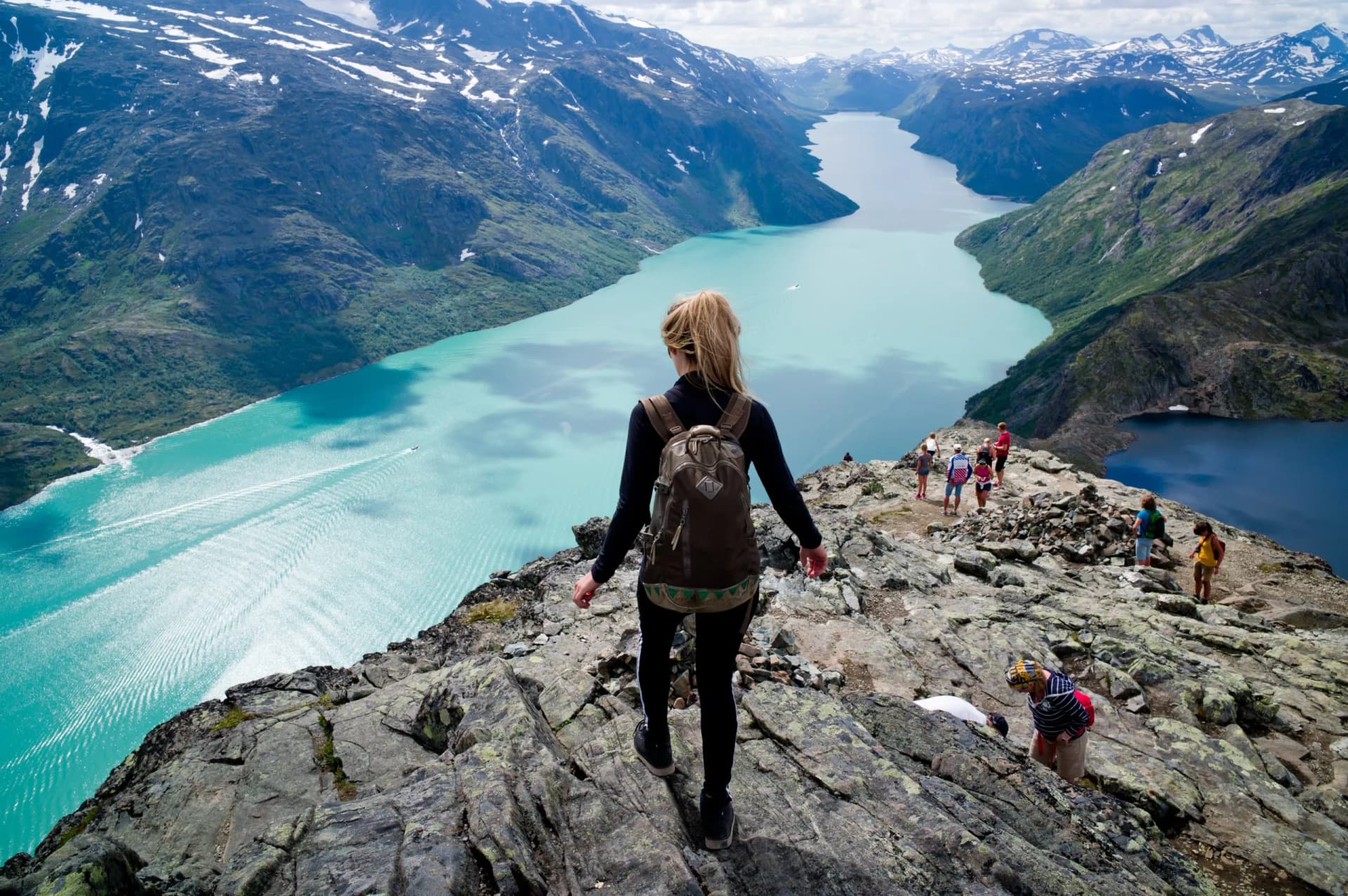 Blond, young woman hiking  Besseggen, Jotunheimen,