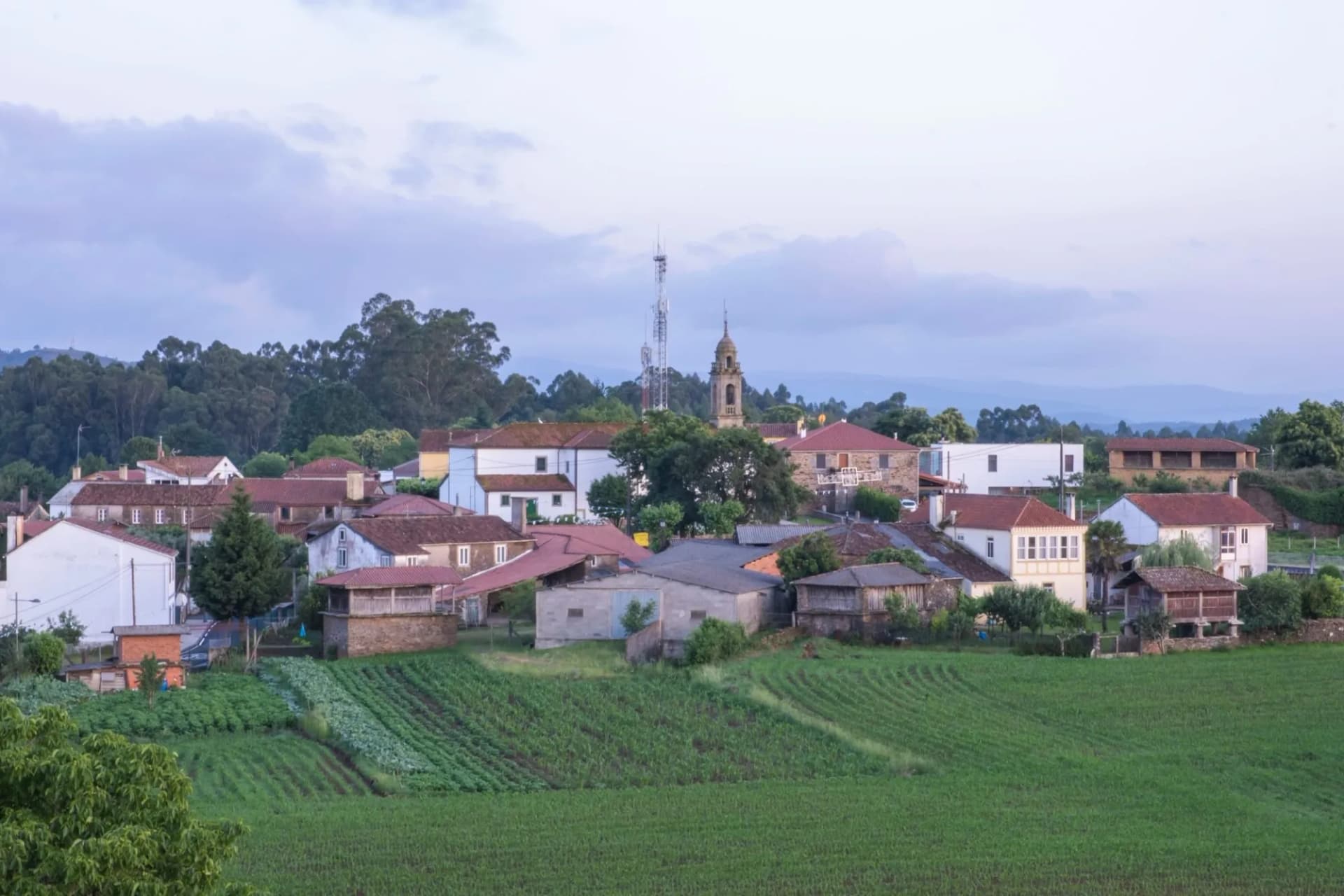 O Pedrouzo, O Pino Galicia, Spain - 11 June, 2023. View of the village and the church of Santa Eulalia