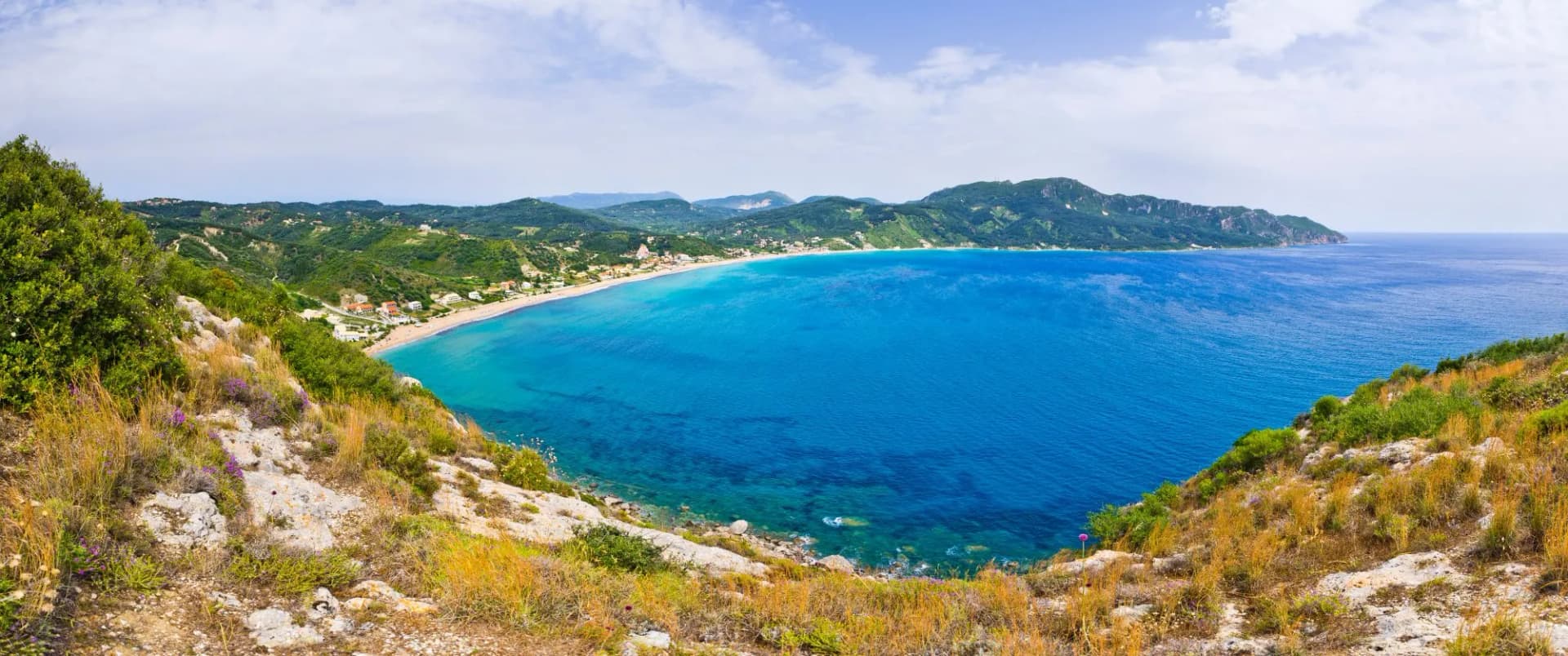 Lagoon and high cliffs near Agios Georgios, Corfu, Greece
