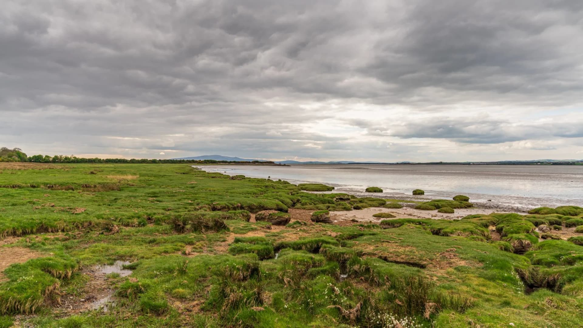 The Solway coast, looking at the Channel of River Esk in Bowness-on-Solway, Cumbria, England, UK