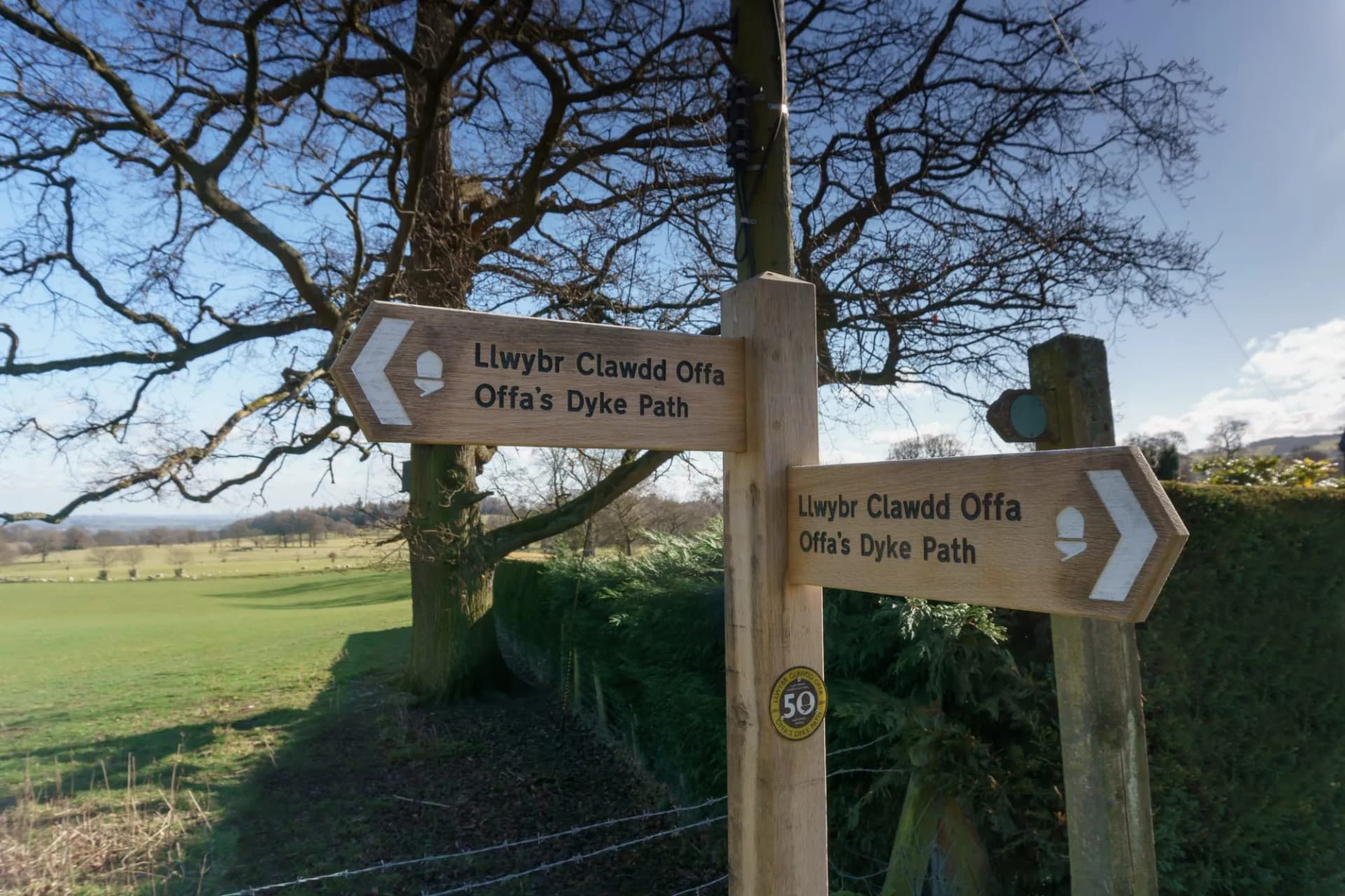Offa's Dyke public footpath sign in English and Welsh languages in Chirk Wales a 177 mile long walking trail in the UK